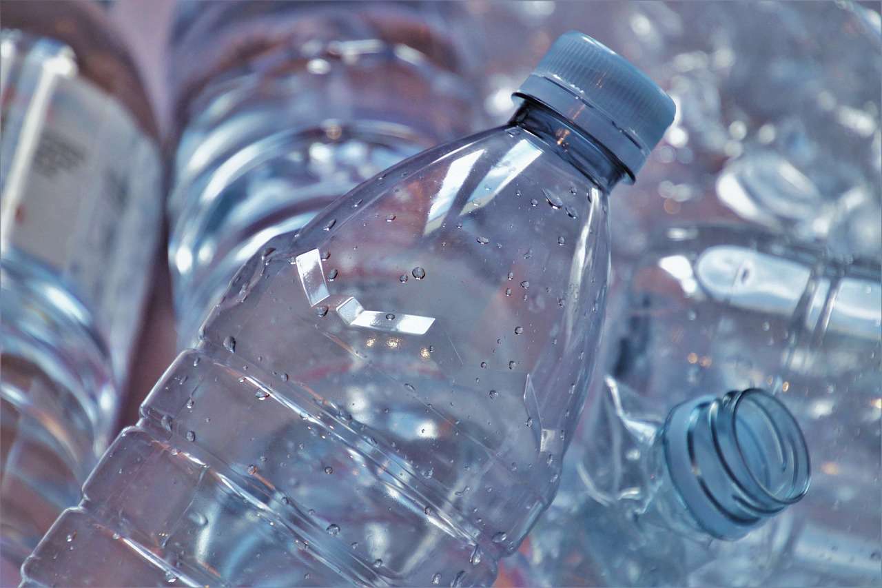 a close up of plastic water bottles