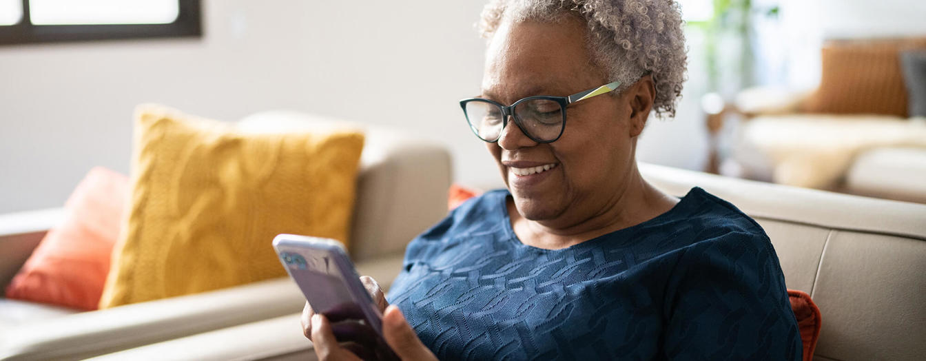 An older woman on her phone