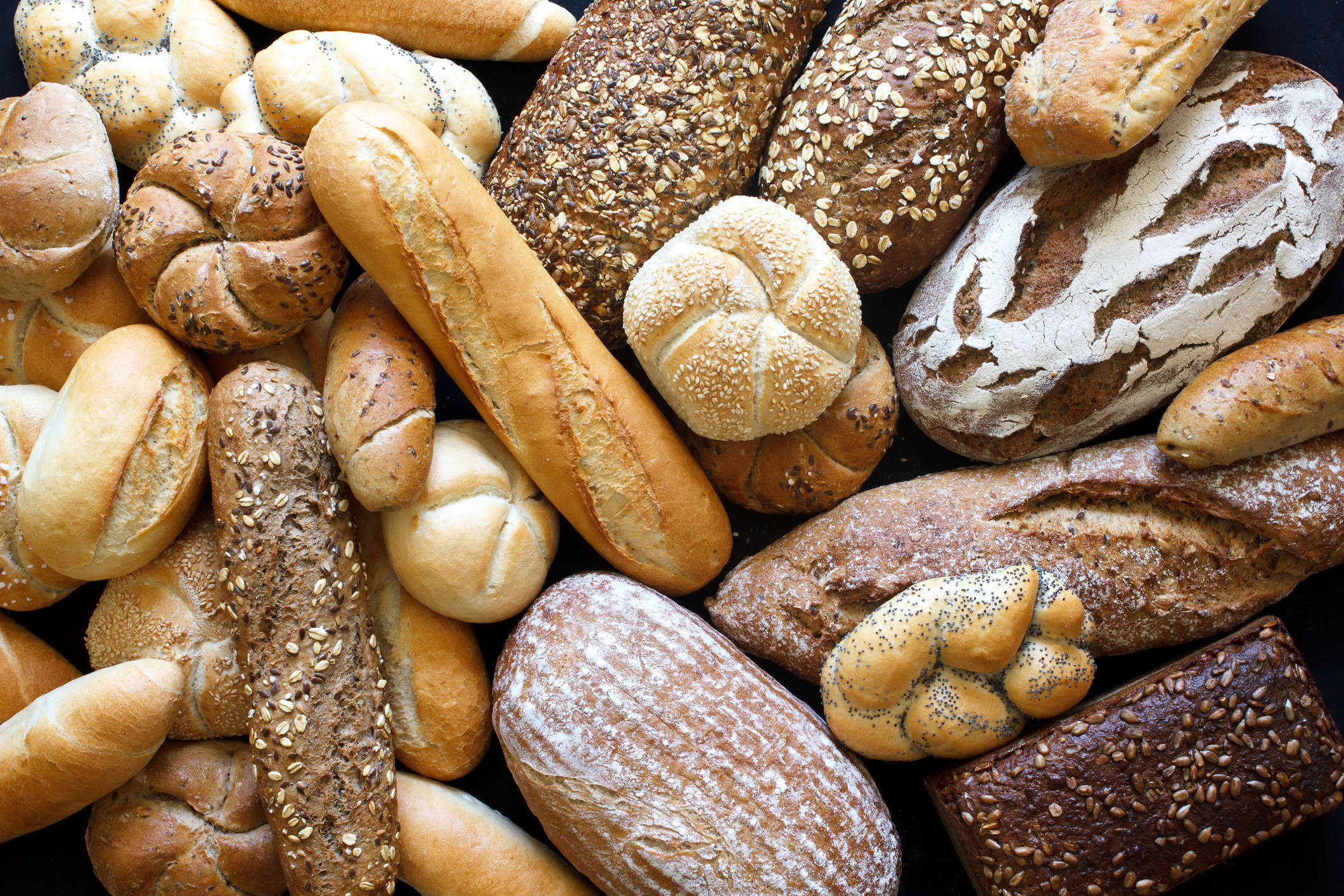 Main image: various types of no-knead bread loaves.