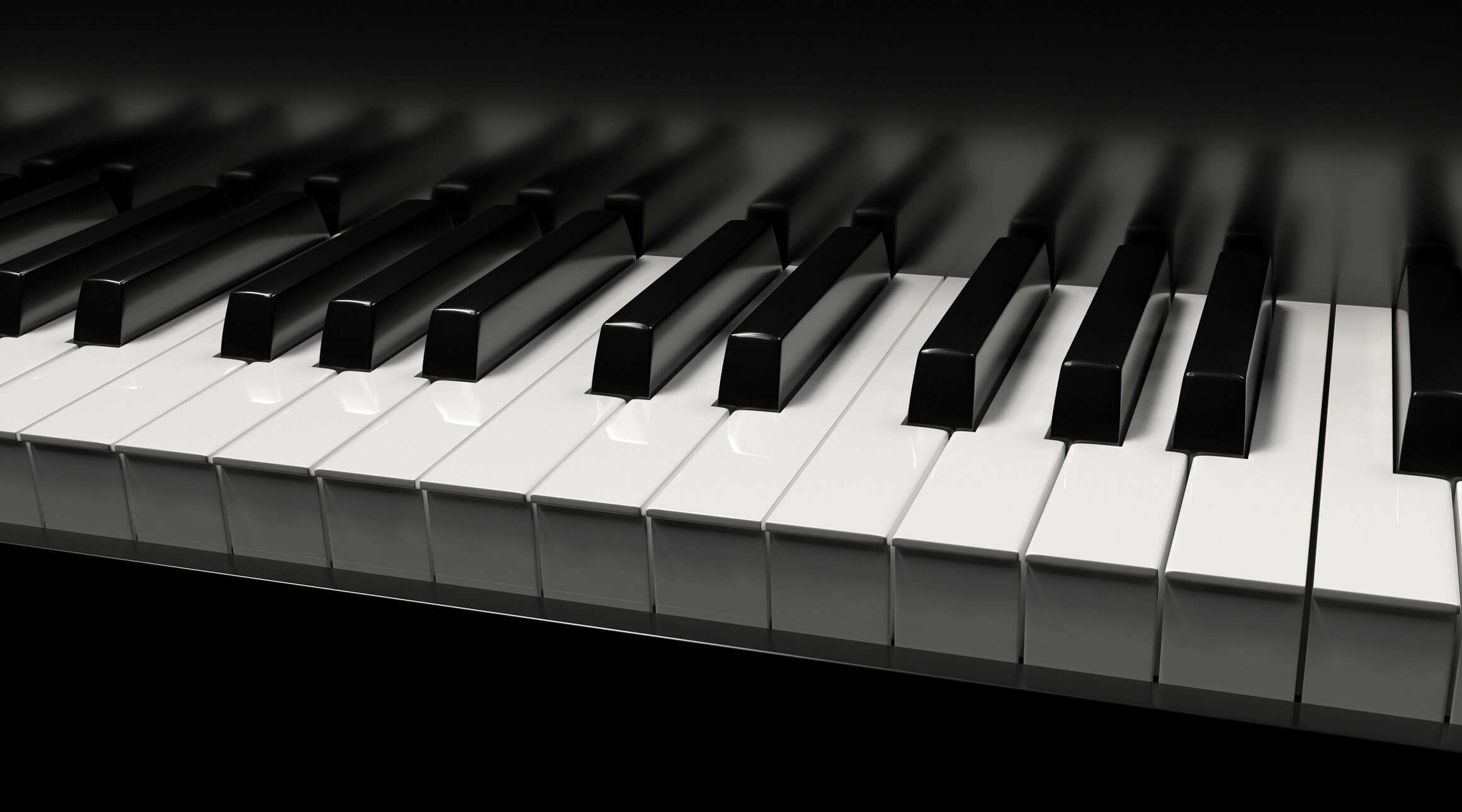 a close up of the keys on a black piano