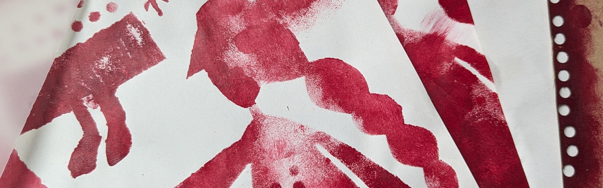 Main Image: A simple stencil art collage in red acrylic paint - stencil of a lady, apple, crown and abstract shapes.