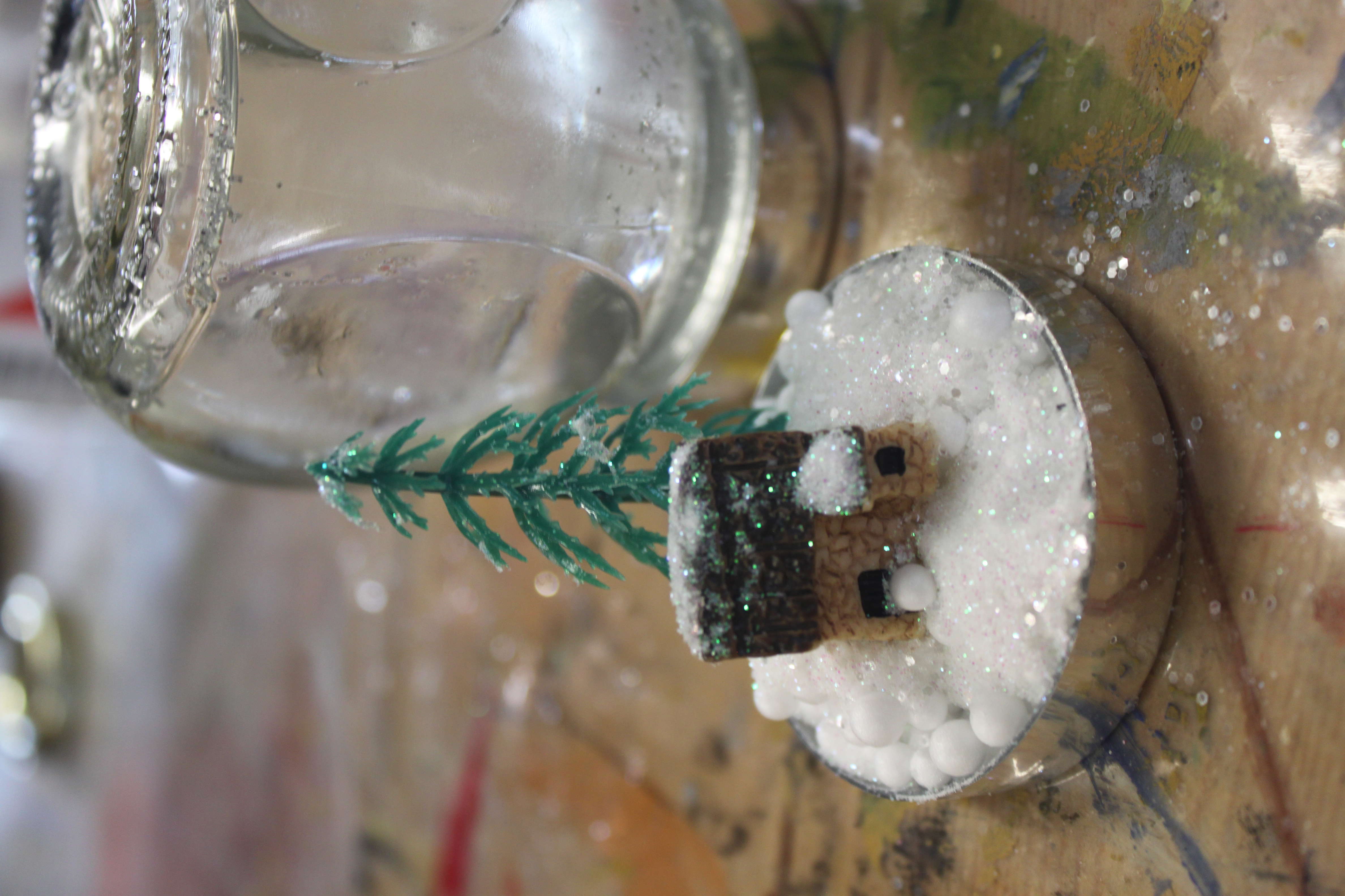 a small snow scene in a tealight container made by Kim Searle