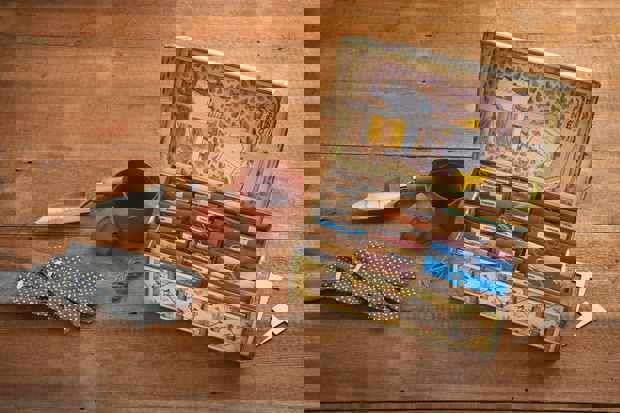 Main image: a decorated seed storage box, covered with different papers and details using decoupage techniques.