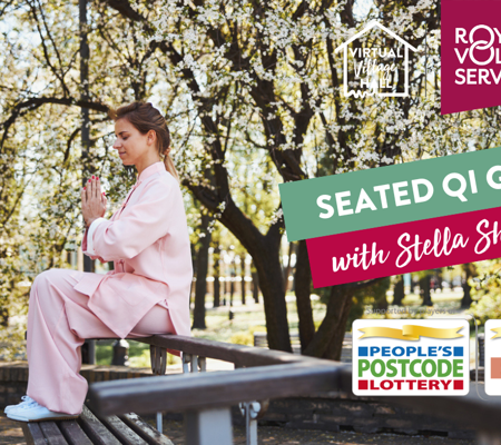 A woman wearing pink clothes sat on a bench outdoors practicing qi gong