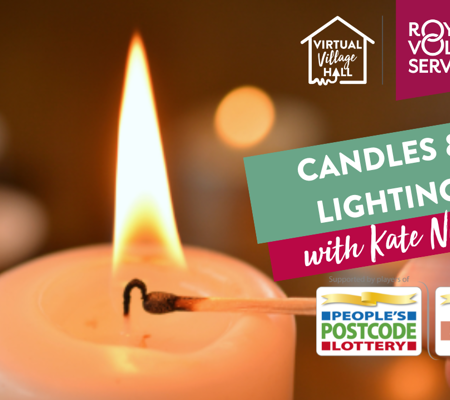 a close up of a match lighting a candle