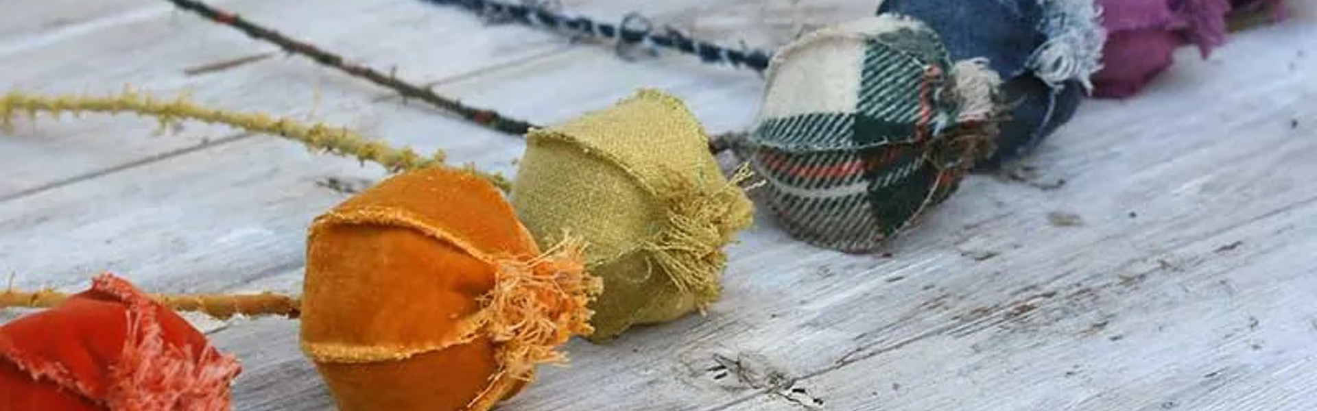 orange green red and pattern fabric poppy seed heads