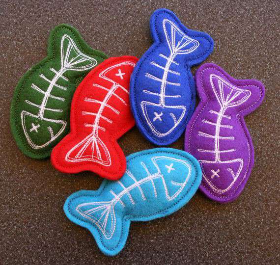 Main Image;: Photo of DIY pet toys for cats, brightly coloured, handsewn fish cat toys.