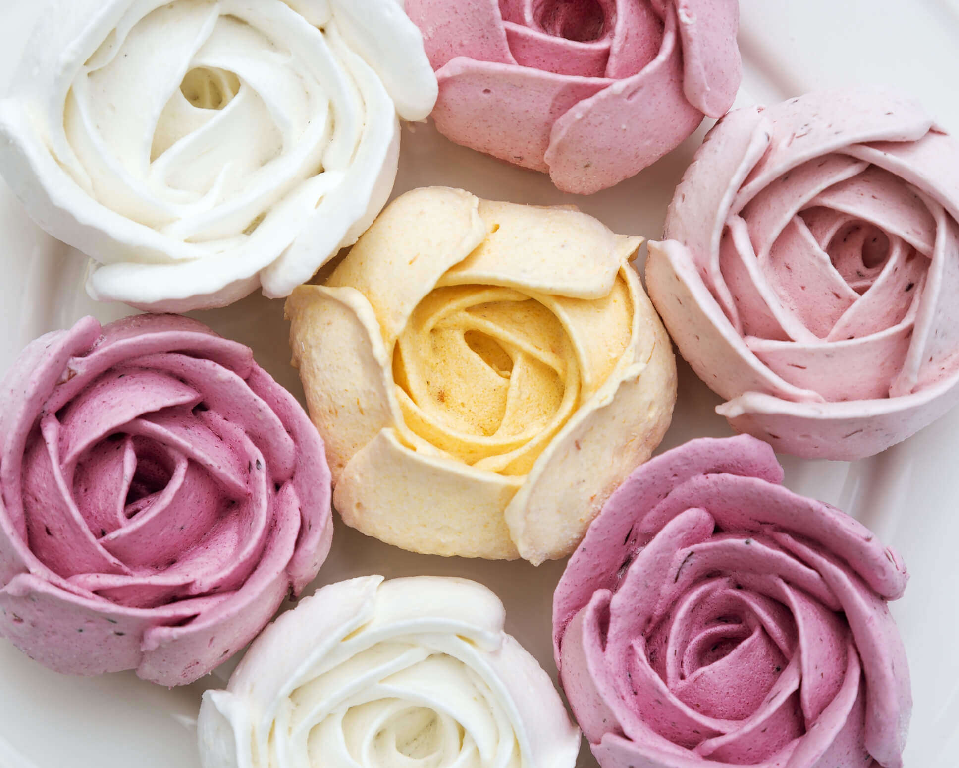 pink white and yellow sugar paste roses