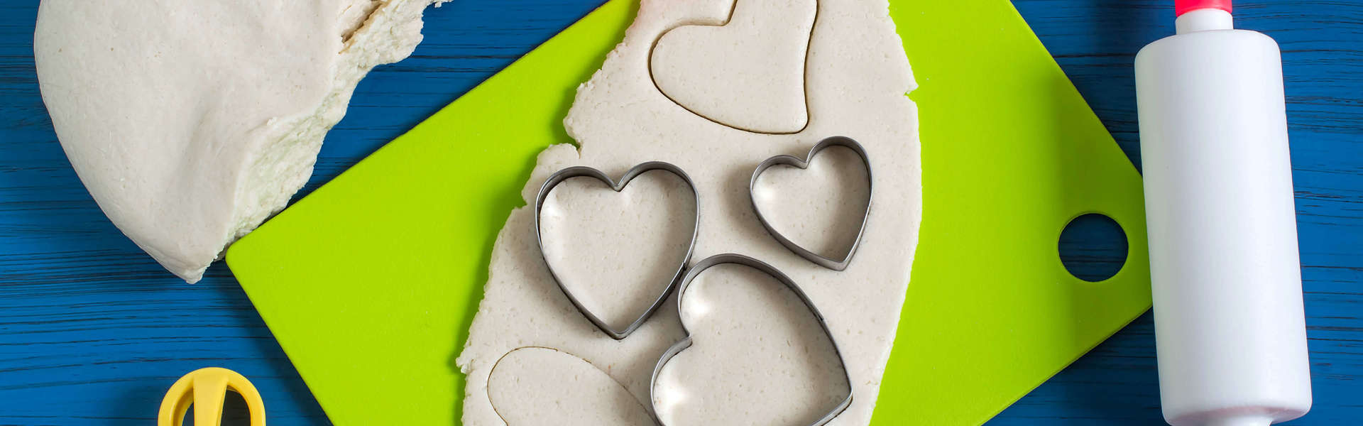 various salt dough making tools on a blue table