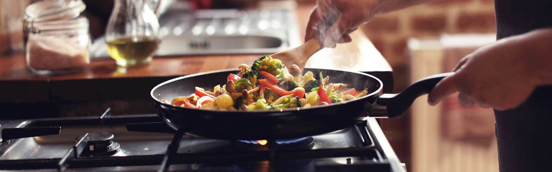 Someone cooking a savoury dish