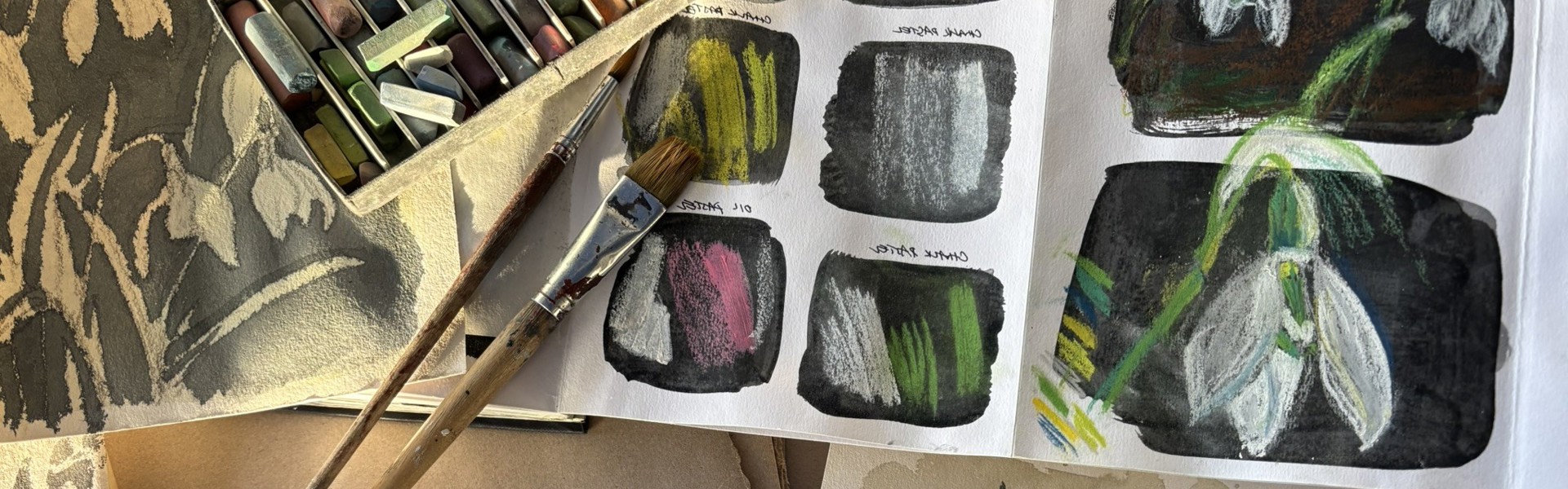 A beautiful watercolour depiction of snowdrops, featuring their graceful blooms and lush green foliage, evoking a sense of spring.