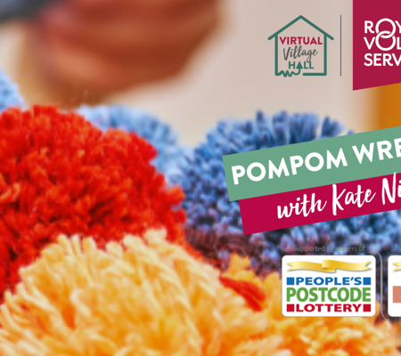 a close up of multicoloured pom poms