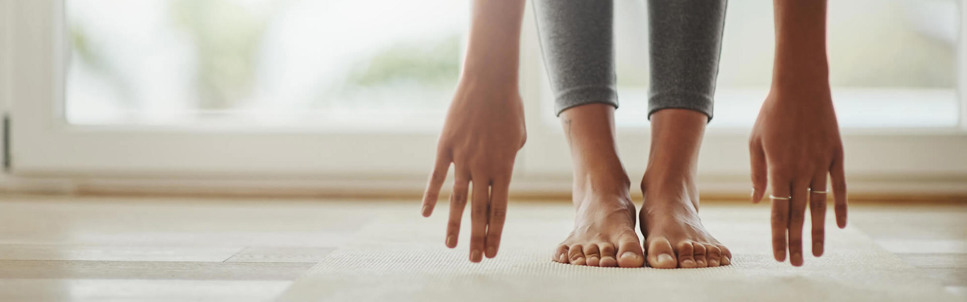 Someone doing gentle floor exercises