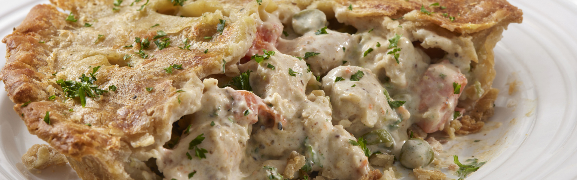 Main image: Chicken And Tarragon Pie With Flaky Homemade Pastry.