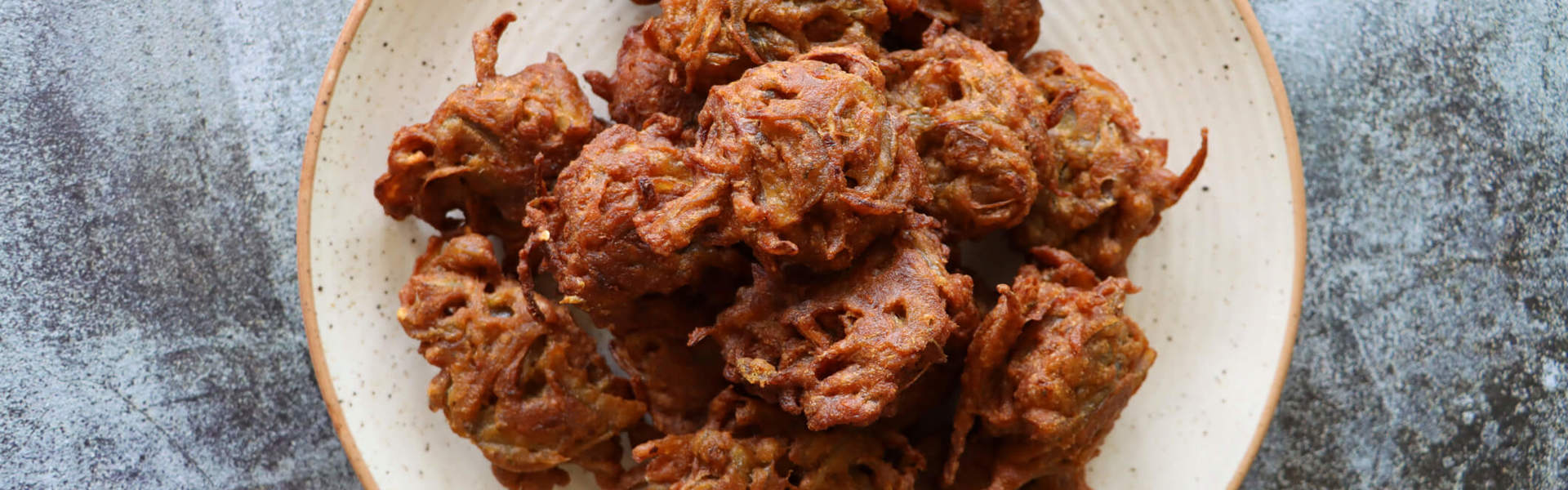 a plate of homemade onion bhajis