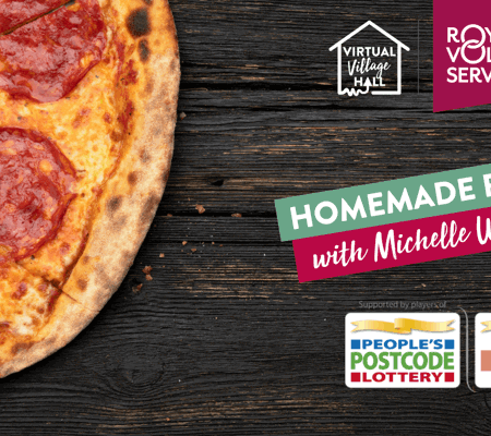 a close up of a pepperoni pizza on a wooden background