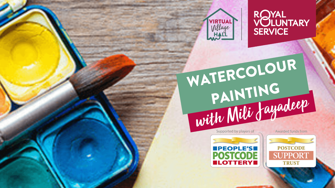 watercolour paint trays on a wooden table with a paintbrush resting on the case and canvas paper below