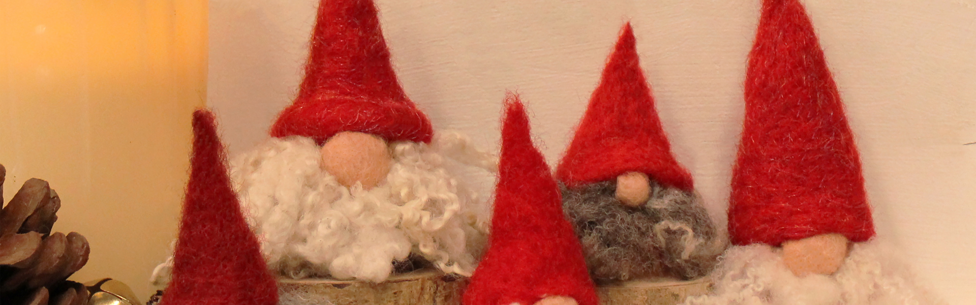 a close up of needle felted little gnomes (tomte) made by Steffi Stern