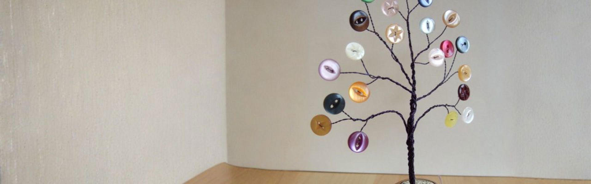 Main Image: a cute decorative wire tree, made with florist wire, buttons and beads.