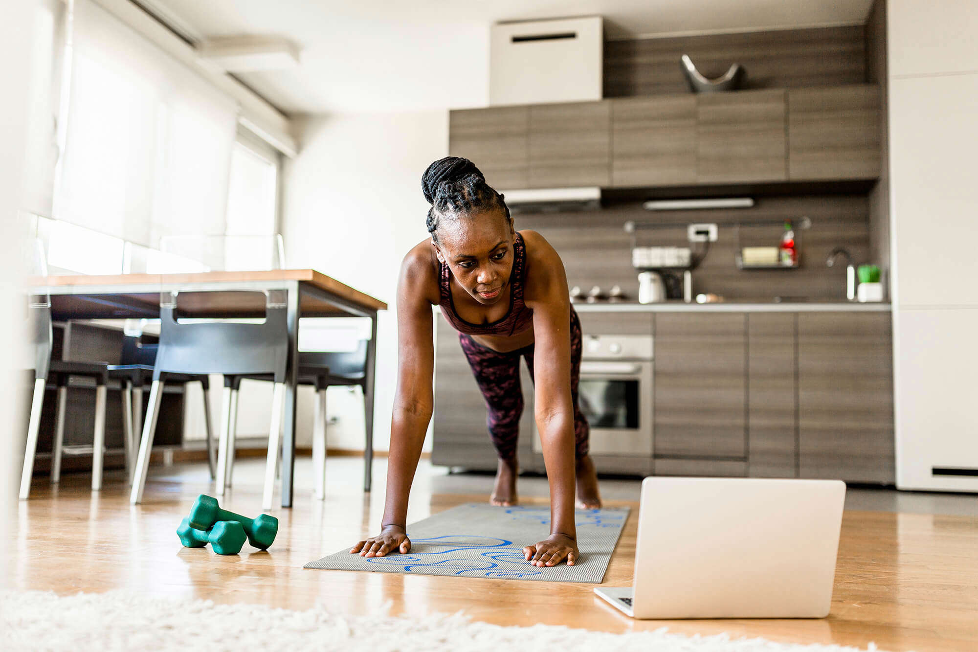 A woman working out at home 