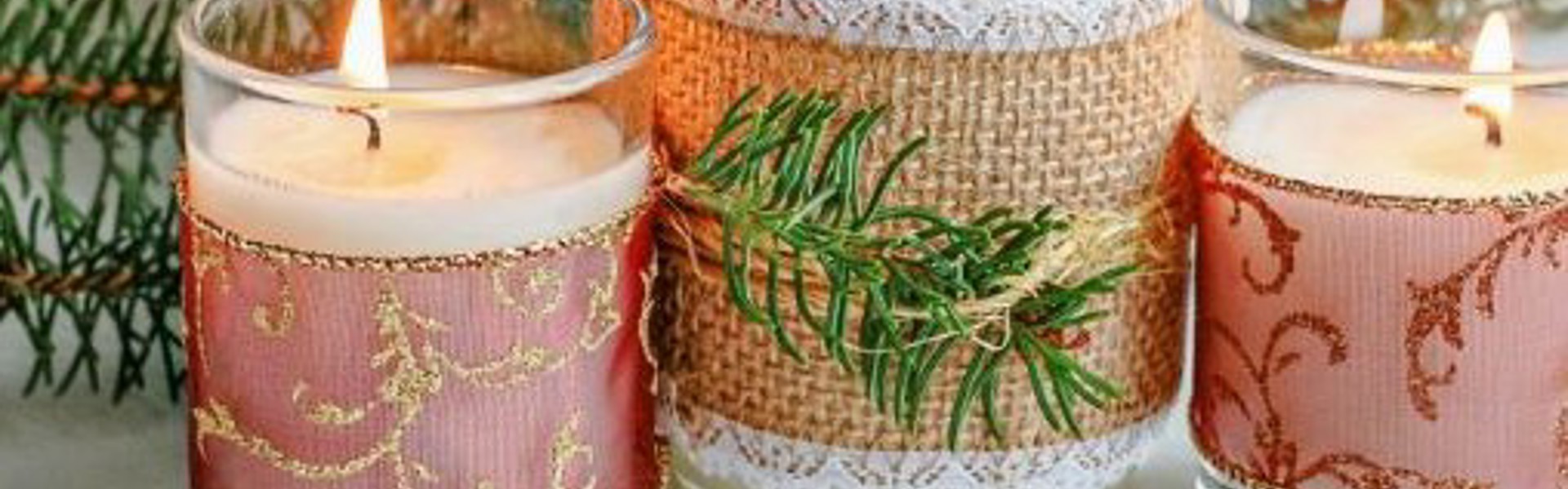 Main image: three homemade scented candles with festive ribbon and decoration.