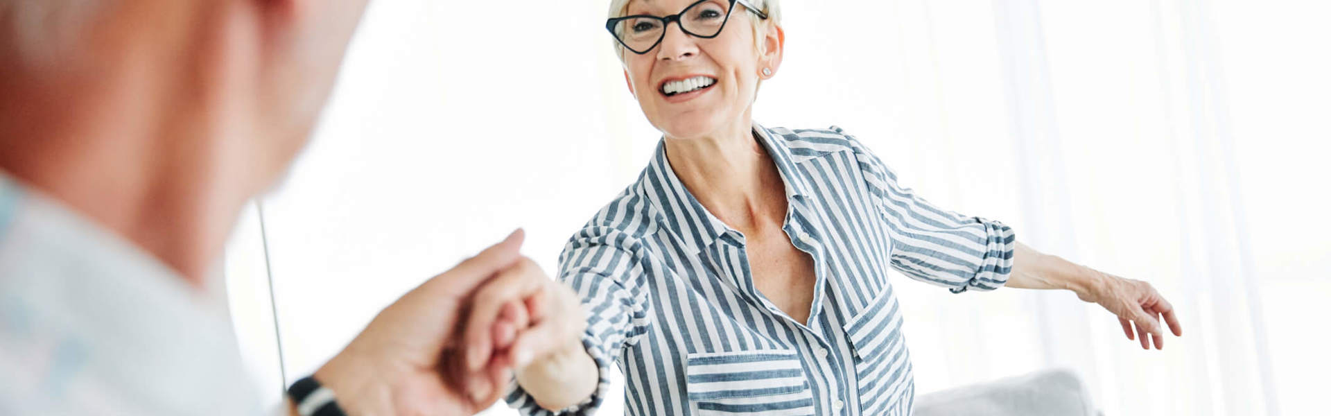 A couple dancing at home